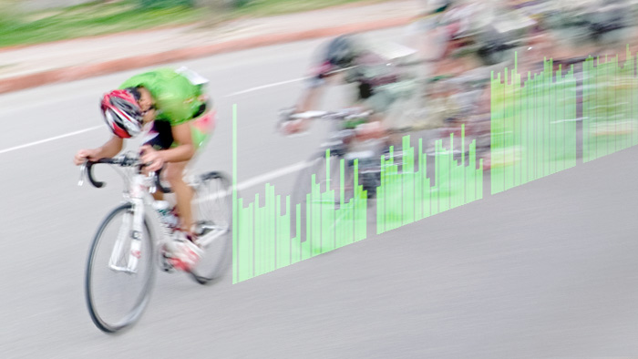 Shot Of A Cycling Race With A Graphic Overlay Of A Watt Per Kg Chart