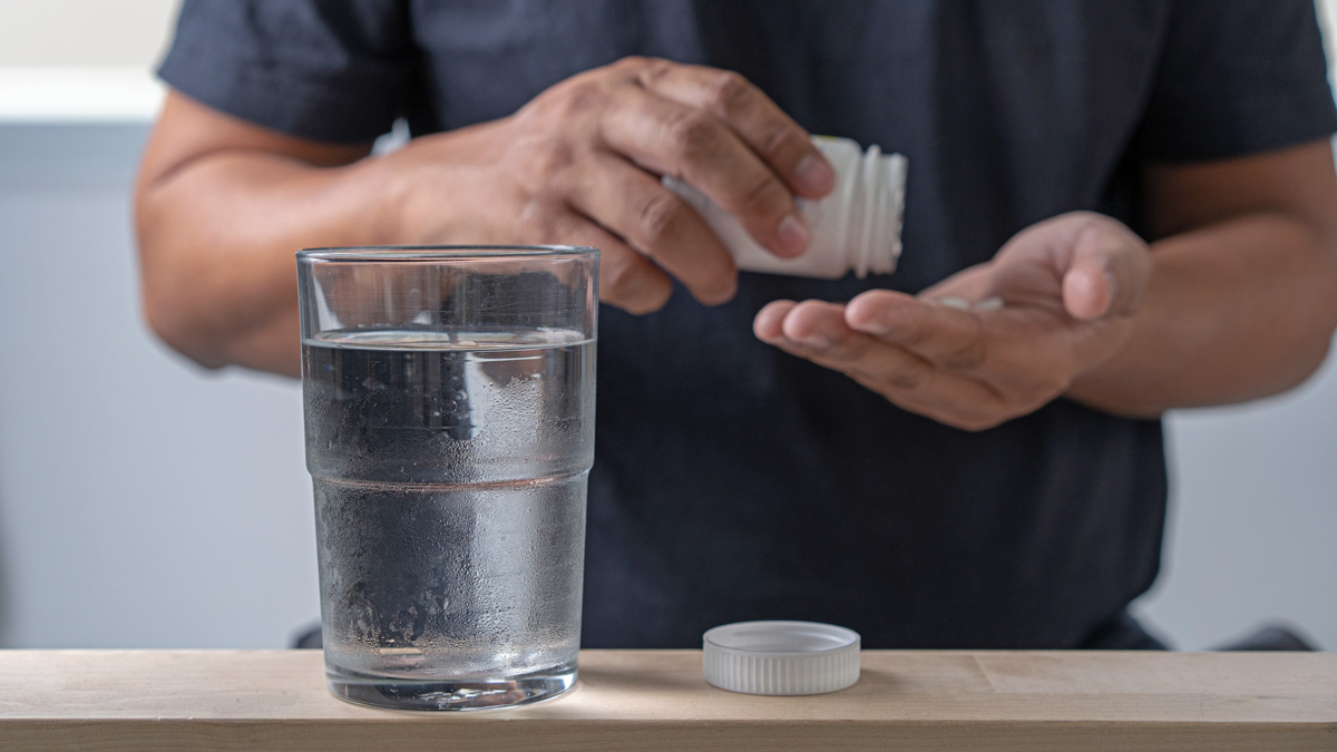 Sick Man Medicines For Sick Pills Spilling Out Of Bottle