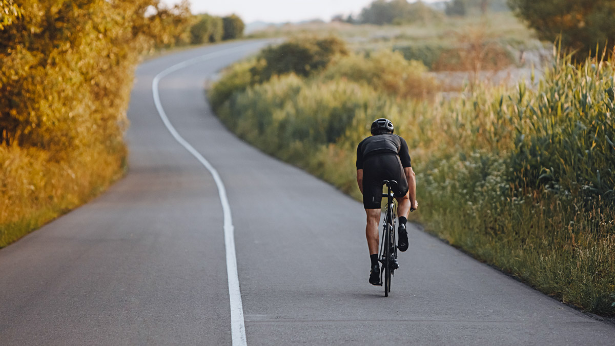 Image Of A Strong Male Cyclist Practicing Cadence Training