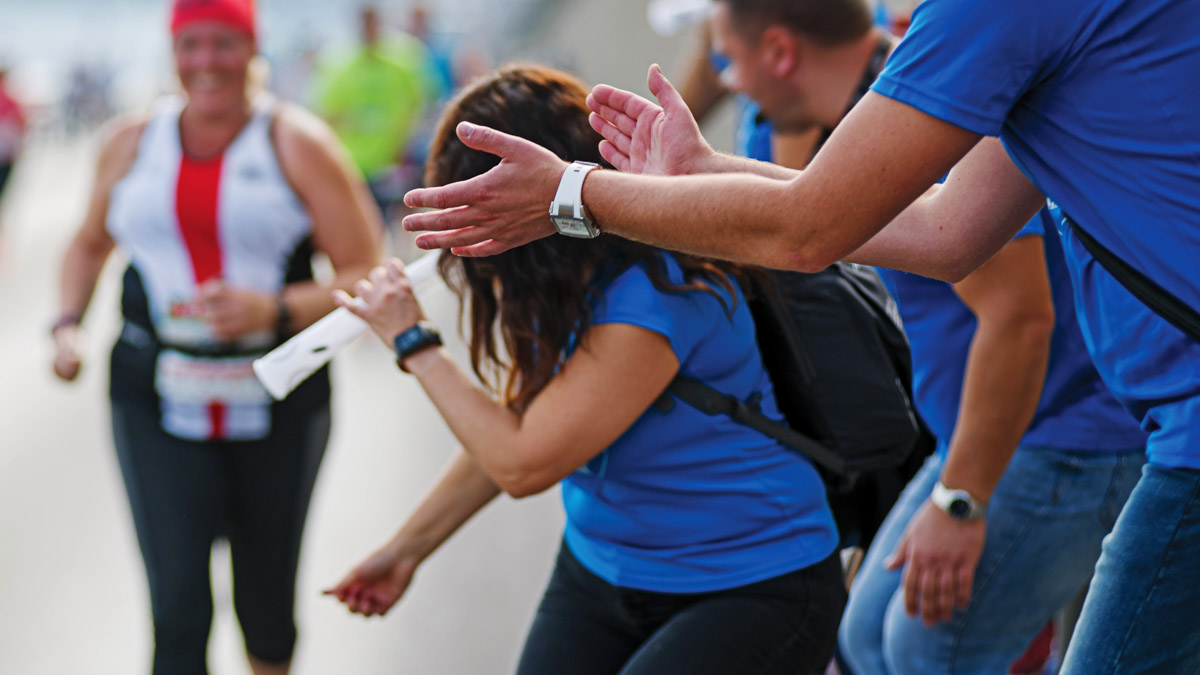 Ultramarathon Support Crew Cheers On Their Ultramarathon Runner