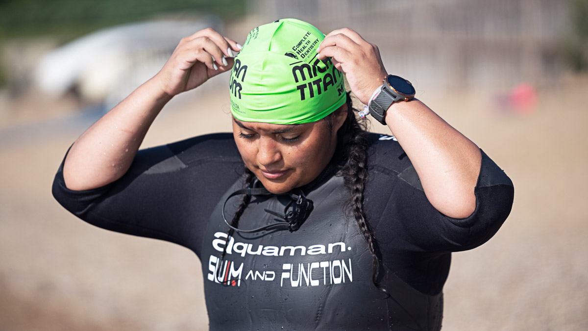 A Woman In A Wetsuit Preparing To Do An Open Water Training Swim