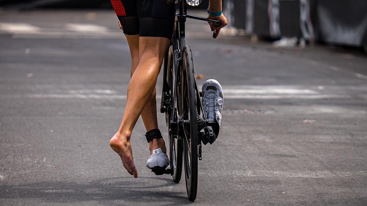 A Triathlete Preparing To Jump Off The Bike Like A Cyclocross Rider