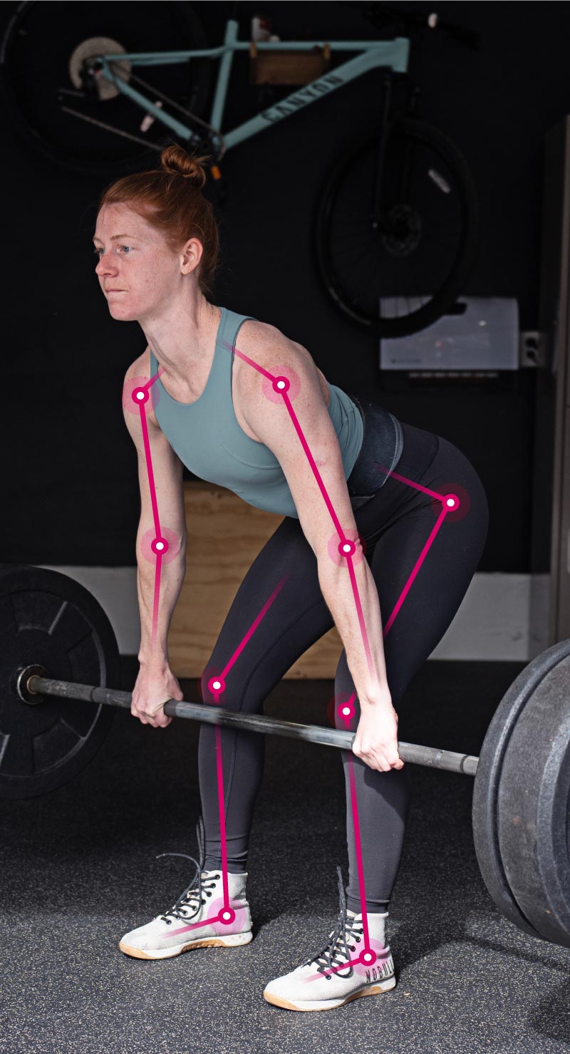 Female Athlete Performing Compound Movement I.e. Deadlift