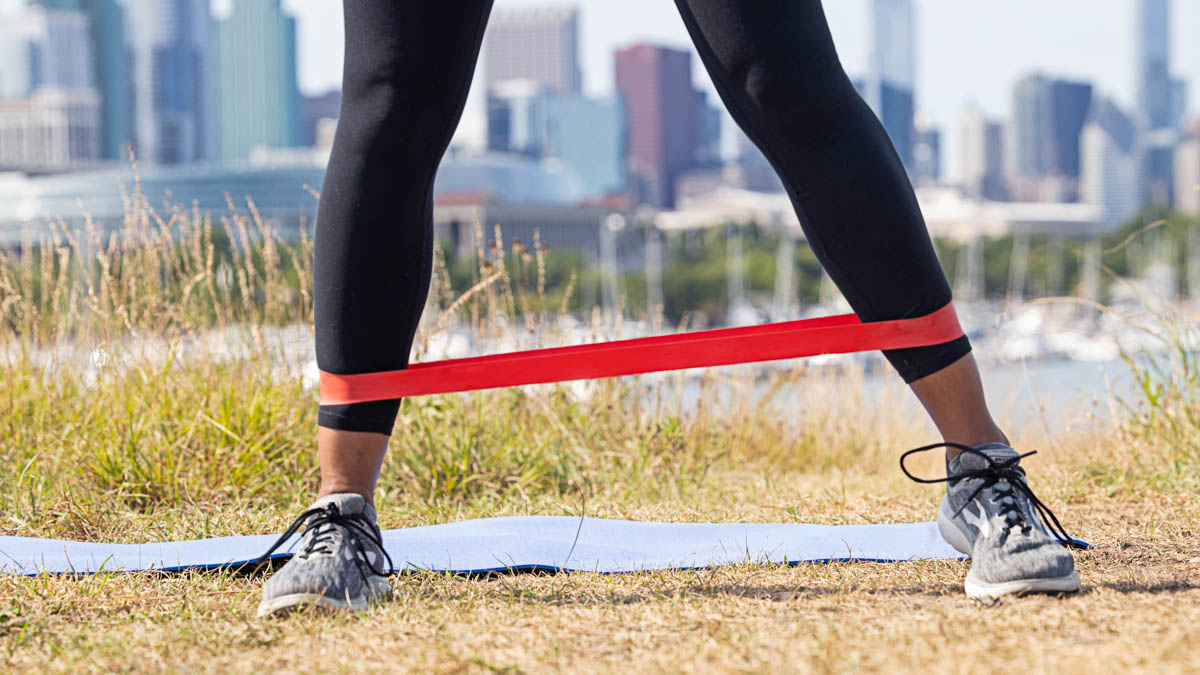 An Athlete Using A Therapy Band To Resolve It Band Issues