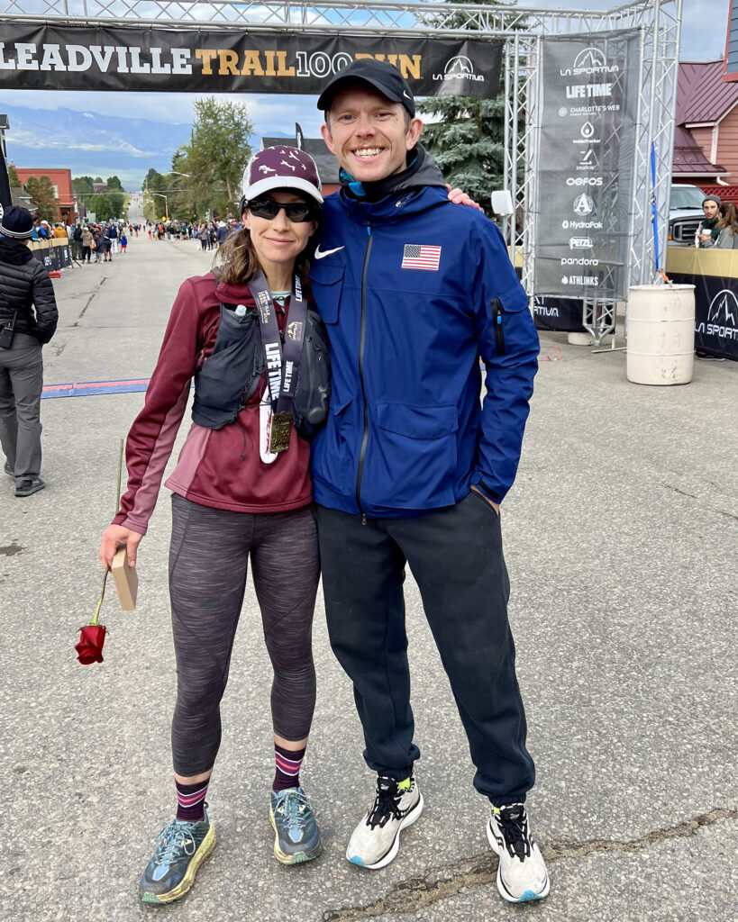 Kristin Gablehouse with her coach Andrew Simmons at the finish line of the Leadville Trail 100