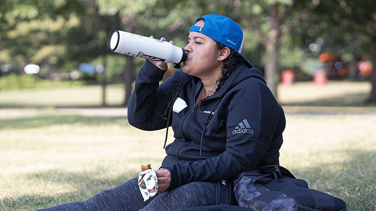 Female Triathlete Fueling After A Strength Training Workout