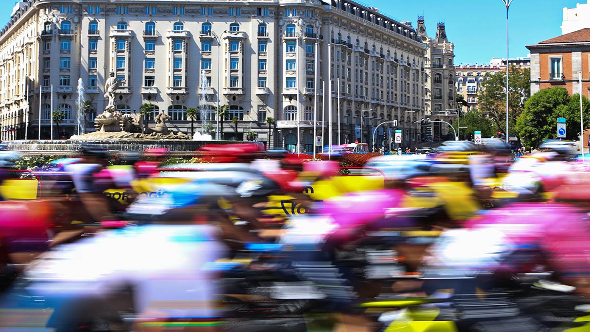 Blurry Bike Racers Flying Down Road