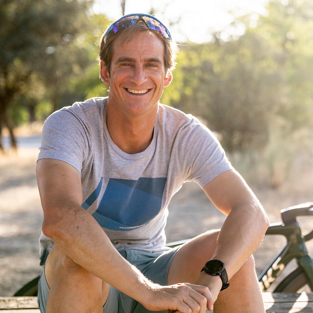 Portrait Of Yago Alcalde On A Bench By His Bike In Spain